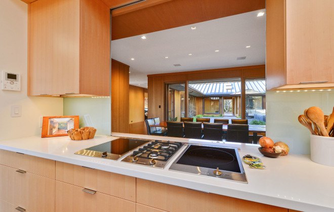 Glasshouse home maintenance, Glasshouse, mid-century house, green remodel, green renovation, Piedmont, LEED Platinum-certified house, LEED Platinum certification, recycled building materials, natural building materials, PV film, photovoltaic thin film, solar power, rainwater harvesting
