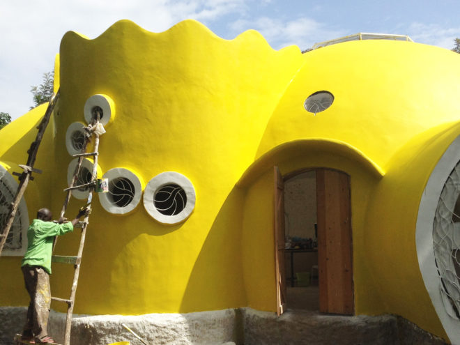 bright yellow dome home, Mama Dolfine's orphanage, Korando Educational Center, brick dome home, Kisumu dome home, Kenya dome home, dome home in Kenya, sustainable dome home, Torsten Kremser, Better Me Foundation