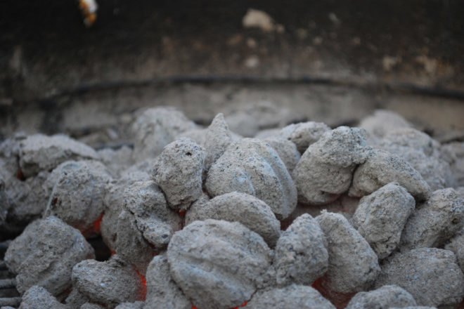 Smoldering charcoal in a grill