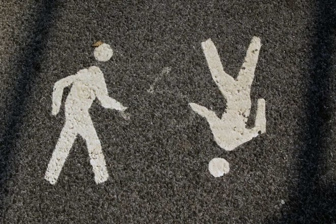 walking symbols on a road