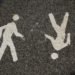 walking symbols on a road