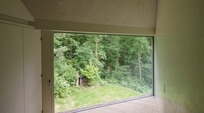 Casa Forest, Switzerland, forest residence, Basel, Daluz Gonzalez Architekten, green architecture, double-height space, natural light