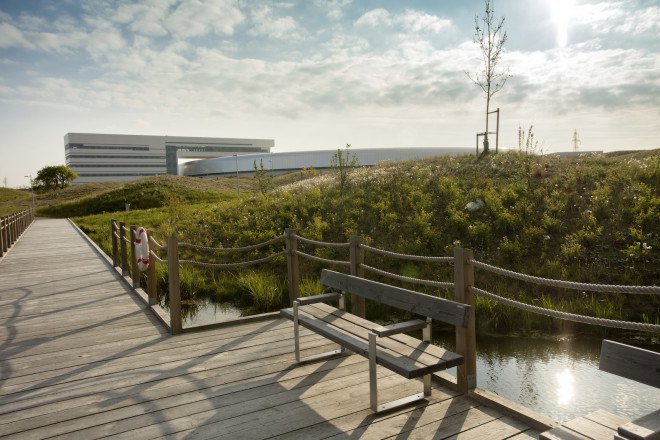 MAX IV laboratory landscape design by Snøhetta, wave land art, stormwater management in land art, Science City near Lund, MAX IV laboratory by Fojab