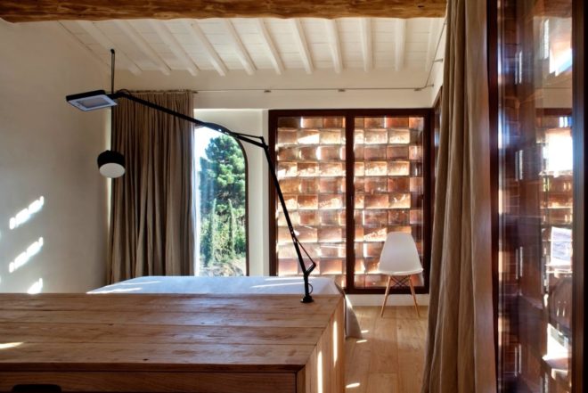 MIDE Architetti, renovated 19th Century home, Farmhouse in the countryside, Tuscany, renovated stone home, stylish interiors, terracota bricks louvre, lime-based plaster