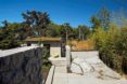 Measured Architecture, 90% recycled, Cloister House, Vancouver, playful elements, Japanese stone mason, Tamatsu Tongu, artist Fei Disbrow, weathering steel ladder, recycled bungalow