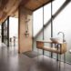 Peter Grundmann, prefab home, low cost home, House Neiling II, raised home, glass and wood minimal home, Berlin, single woman owner, DIY furniture, Löwenberger Land