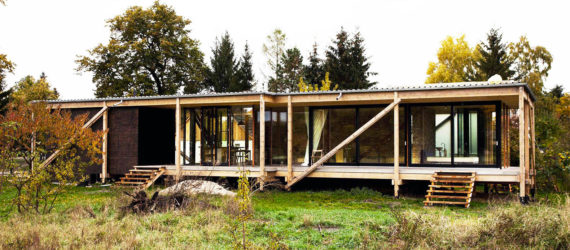 Peter Grundmann, prefab home, low cost home, House Neiling II, raised home, glass and wood minimal home, Berlin, single woman owner, DIY furniture, Löwenberger Land