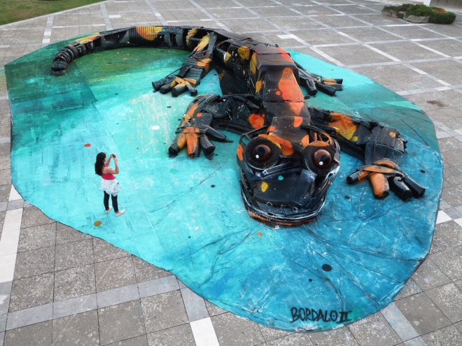 Big Trash Animal by Bordalo II, environmental street art, upcycled trash into animals, recycled trash animals, recycled trash animal art, animal trash art, environmental destruction expressed through art