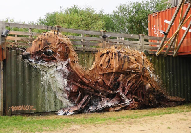 Big Trash Animal by Bordalo II, environmental street art, upcycled trash into animals, recycled trash animals, recycled trash animal art, animal trash art, environmental destruction expressed through art