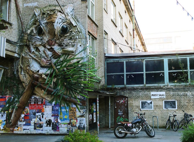 Big Trash Animal by Bordalo II, environmental street art, upcycled trash into animals, recycled trash animals, recycled trash animal art, animal trash art, environmental destruction expressed through art