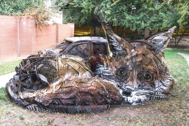 Big Trash Animal by Bordalo II, environmental street art, upcycled trash into animals, recycled trash animals, recycled trash animal art, animal trash art, environmental destruction expressed through art