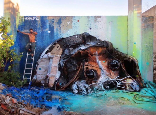 Big Trash Animal by Bordalo II, environmental street art, upcycled trash into animals, recycled trash animals, recycled trash animal art, animal trash art, environmental destruction expressed through art