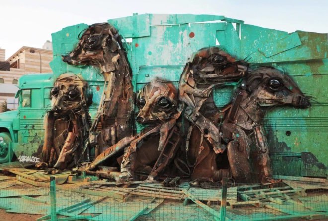 Big Trash Animal by Bordalo II, environmental street art, upcycled trash into animals, recycled trash animals, recycled trash animal art, animal trash art, environmental destruction expressed through art