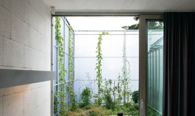 Casa en una Casa, House within a house, Plural architects, detached house, Slovakia, swimming pool, natural light, rear garden, storage spaces, green architecture