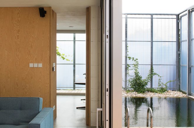 Casa en una Casa, House within a house, Plural architects, detached house, Slovakia, swimming pool, natural light, rear garden, storage spaces, green architecture