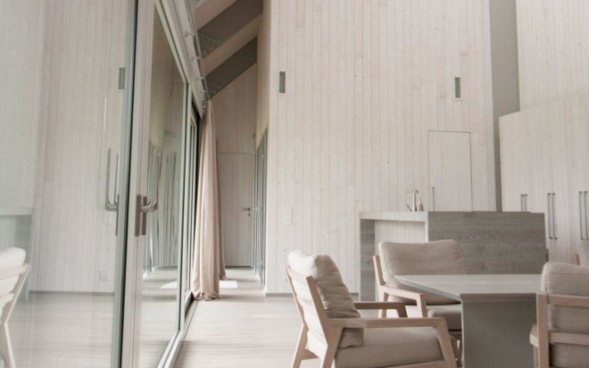 Archispektras, Dune House, thatched roof, holiday house, Latvia, reed hatch, timber cladding, pine wood, green architecture, laminated timber, wood-burning stove