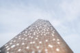 Norwegian Mountaineering Center by Reiulf Ramstad Arkitekter, Norwegian Mountaineering Center architecture, mountain inspired architecture, climbing wall in Norway, diamond shingle facade