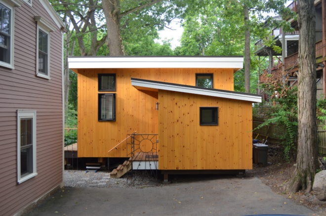 living building challenge, living building certified, green building, passive building, net zero energy, net positive energy, sustainable building, sustainable architecture, solar panels, rainwater collection, geothermal wells, wind turbines
