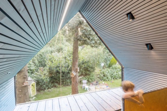 Enchanted Shed by Sue Architekten, adaptive reuse of outbuilding, 1930s farm building transformation, coal tar timber cladding,