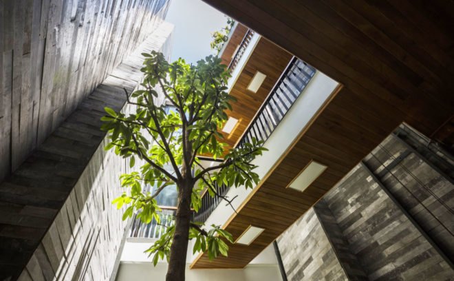 Garden House in Vietnam, Ho Khue Architects, green-roofed narrow house, Vietnam, natural ventilation, Vietnam, green architecture, vertical garden, green roof, perforated brick, brickwork, natural light, planters