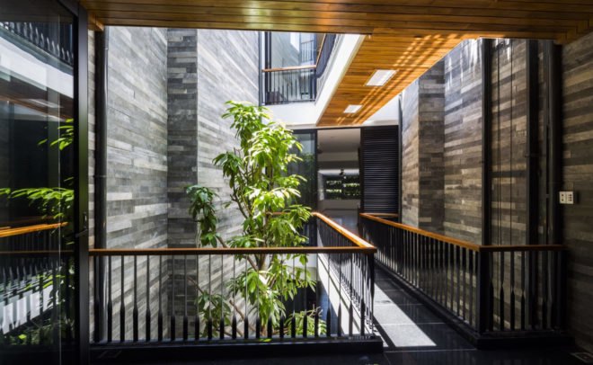 Garden House in Vietnam, Ho Khue Architects, green-roofed narrow house, Vietnam, natural ventilation, Vietnam, green architecture, vertical garden, green roof, perforated brick, brickwork, natural light, planters