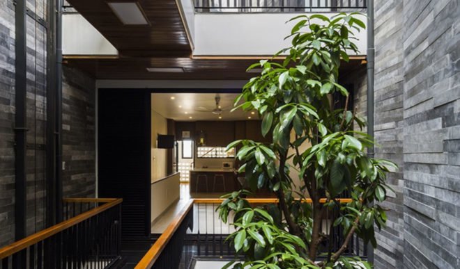 Garden House in Vietnam, Ho Khue Architects, green-roofed narrow house, Vietnam, natural ventilation, Vietnam, green architecture, vertical garden, green roof, perforated brick, brickwork, natural light, planters