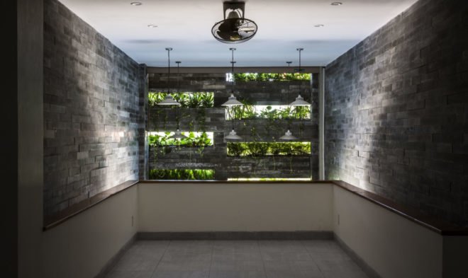 Garden House in Vietnam, Ho Khue Architects, green-roofed narrow house, Vietnam, natural ventilation, Vietnam, green architecture, vertical garden, green roof, perforated brick, brickwork, natural light, planters