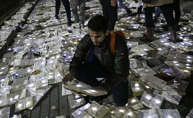Luzinterruptus, Literature vs. Traffic, art installation, interactive installation, Toronto, Nuit Blanche, Canada, temporary installation, recycled art, green design
