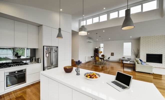 ITN Architects, Neumannhaus, green renovation, Victorian house, Melbourne, Australia, brick facade, green architecture, green fireplace, natural materials, cedar timber, verandah, open plan layout