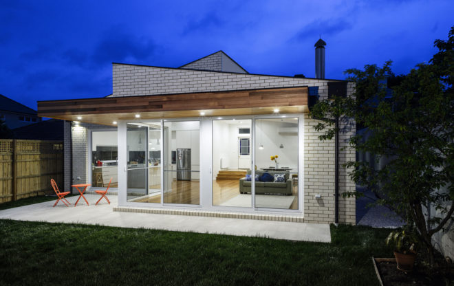 ITN Architects, Neumannhaus, green renovation, Victorian house, Melbourne, Australia, brick facade, green architecture, green fireplace, natural materials, cedar timber, verandah, open plan layout
