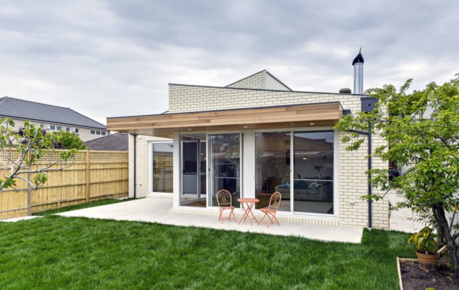 ITN Architects, Neumannhaus, green renovation, Victorian house, Melbourne, Australia, brick facade, green architecture, green fireplace, natural materials, cedar timber, verandah, open plan layout