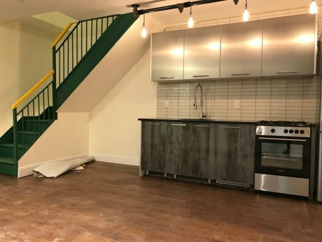 Subway station apartment, mta-themed building,All Year Management, brooklyn, bushwick mta themed house, Jake Berman, bushwick subway, brooklyn architecture, 132A Stanhope Street, STANHOPE STREET STATION, quirky home design, mta home brooklyn, subway home bushwick, urban art