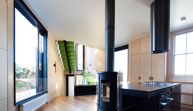 Acute House, Oof! Architecture, green renovation, Victorian cottage, Melbourne, reused building materials, Victorian weatherboard, open spaces, balcony, hanging plants, solar panels, solar hot water, water-efficient toilet, energy efficient appliances