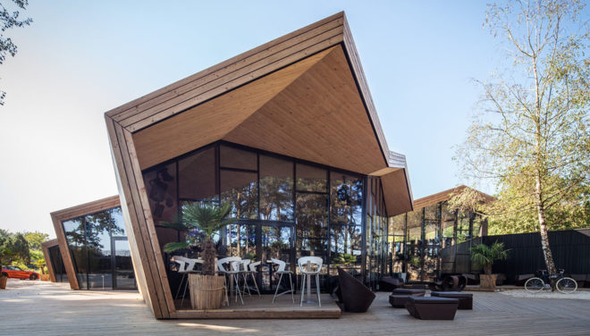 Boos Beach Club Restaurant, Metaform architects, refurbished architecture, green renovation, beach bar, Luxembourg, origami, wooden structure, concrete, green architecture, outdoor terrace
