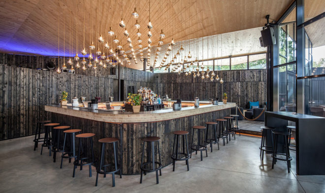 Boos Beach Club Restaurant, Metaform architects, refurbished architecture, green renovation, beach bar, Luxembourg, origami, wooden structure, concrete, green architecture, outdoor terrace