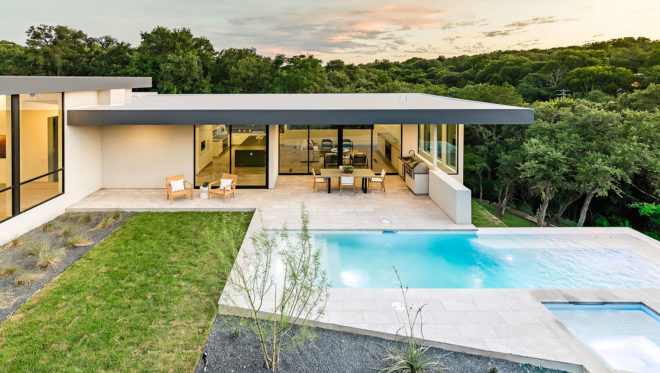 [Bracketed Space] House, Matt Fajkus Architecture, infinity pool, Austin, open-plan, Texas, natural light, green architecture, glazing, glass facade, natural stucco, concrete, cedar, steel