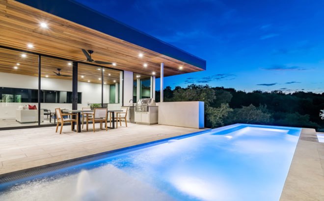 [Bracketed Space] House, Matt Fajkus Architecture, infinity pool, Austin, open-plan, Texas, natural light, green architecture, glazing, glass facade, natural stucco, concrete, cedar, steel