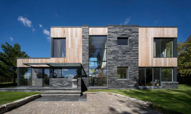 Hemmingford House by SIMARD Architecture, contemporary cottage near Montreal, fieldstone foundations, cedar and slate house, cedar and slate facade