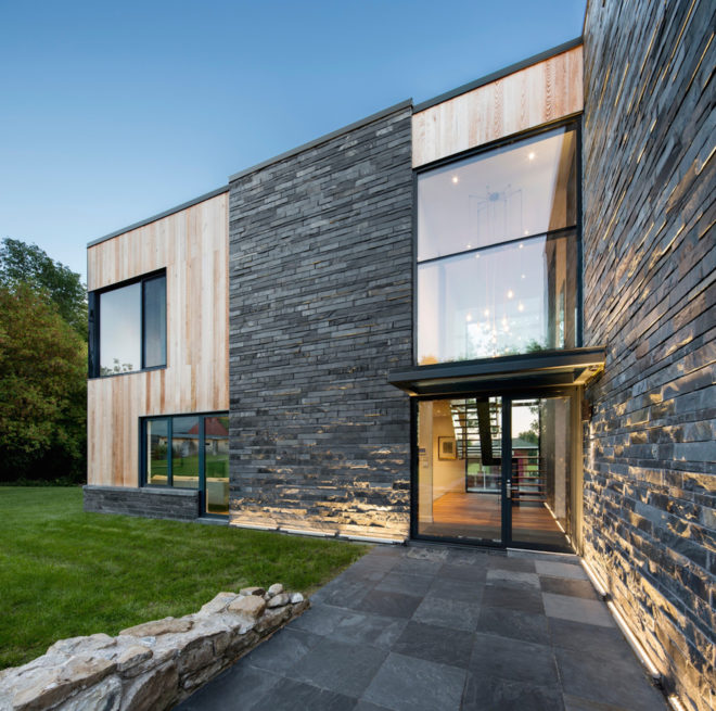 Hemmingford House by SIMARD Architecture, contemporary cottage near Montreal, fieldstone foundations, cedar and slate house, cedar and slate facade