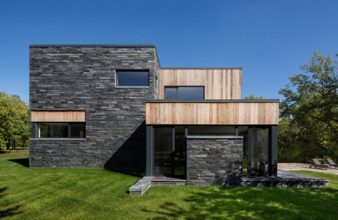 Hemmingford House by SIMARD Architecture, contemporary cottage near Montreal, fieldstone foundations, cedar and slate house, cedar and slate facade