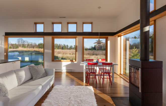 House for Beth by Salmela Architect, Door County contemporary house, house with IKEA furnishings, Wisconsin contemporary architecture, barn-inspired architecture, standing seam metal roof,
