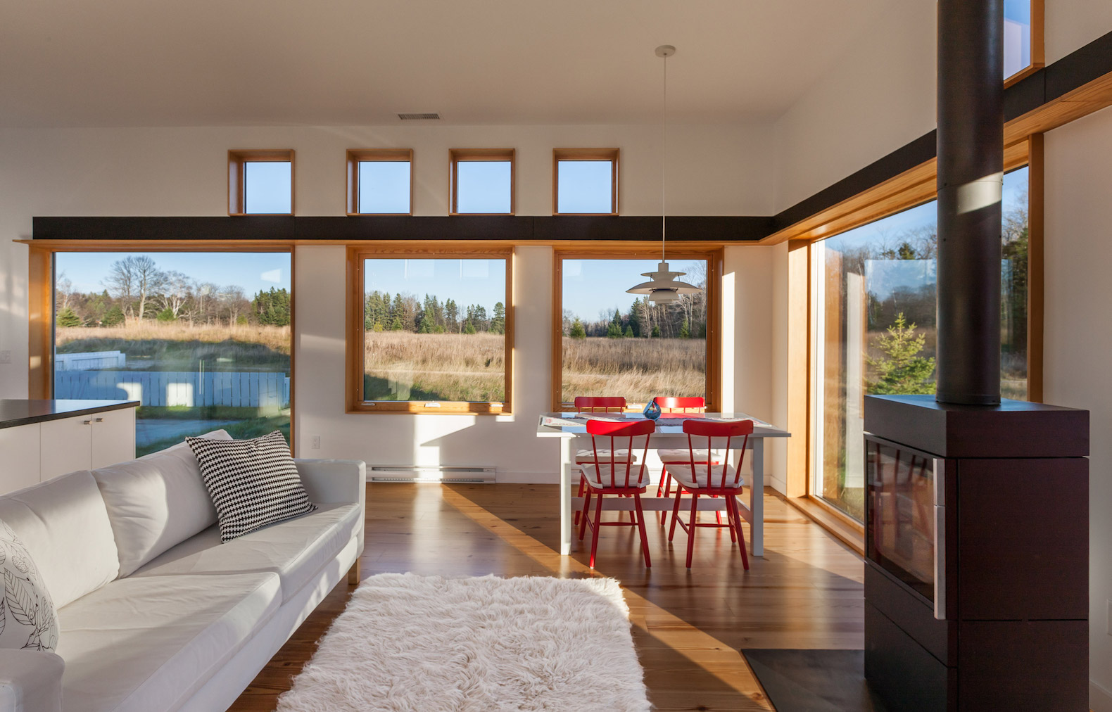 House for Beth by Salmela Architect, Door County contemporary house, house with IKEA furnishings, Wisconsin contemporary architecture, barn-inspired architecture, standing seam metal roof,