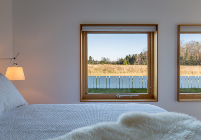 House for Beth by Salmela Architect, Door County contemporary house, house with IKEA furnishings, Wisconsin contemporary architecture, barn-inspired architecture, standing seam metal roof,