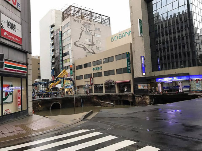 Japan, Japan sinkhole, sinkhole, Fukuoka, Soichiro Takashima, road, hole, sand, cement, sink, sinking, sunken