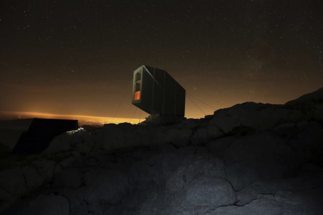 Kanin Winter Cabin by OFIS Arhitekti, prefab alpine cabin, Mount Kanin cabin, compact mountaineering cabin, cantilevered alpine cabin, alpine cabin in Slovenia,