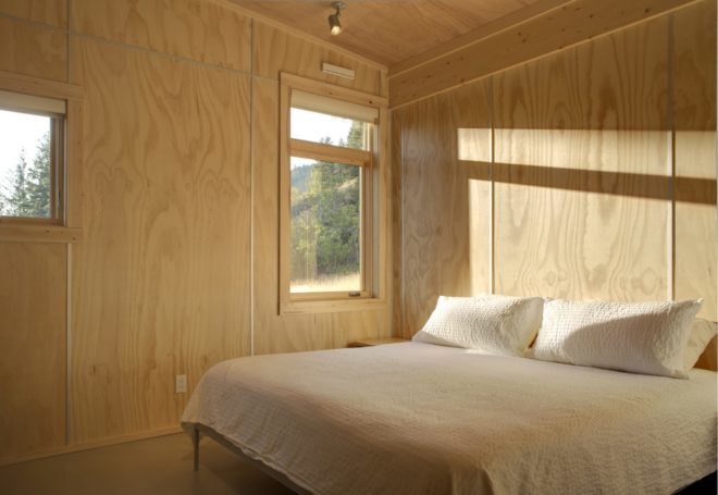 Pine Forest Cabin by Prentiss Balance Wickline Architects, cabin in Methow Valley, affordable modern cabin design, cabin design on a budget, cabin with a small footprint, cantilevered cabin design
