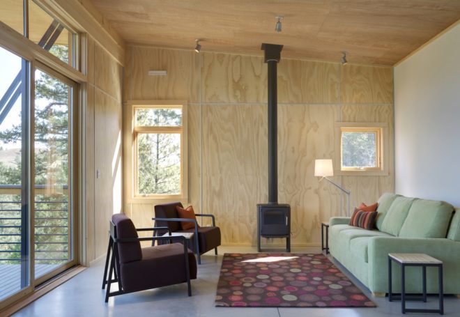 Pine Forest Cabin by Prentiss Balance Wickline Architects, cabin in Methow Valley, affordable modern cabin design, cabin design on a budget, cabin with a small footprint, cantilevered cabin design