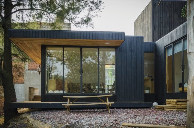 The Black Cabin by Revolution Architects, contemporary cabin in Mexico City, quiet cabin retreat in Mexico City, Mexico city contemporary residential architecture, passive ventilation in a cabin, modular cabin, sustainable cabin, green roofed cabin