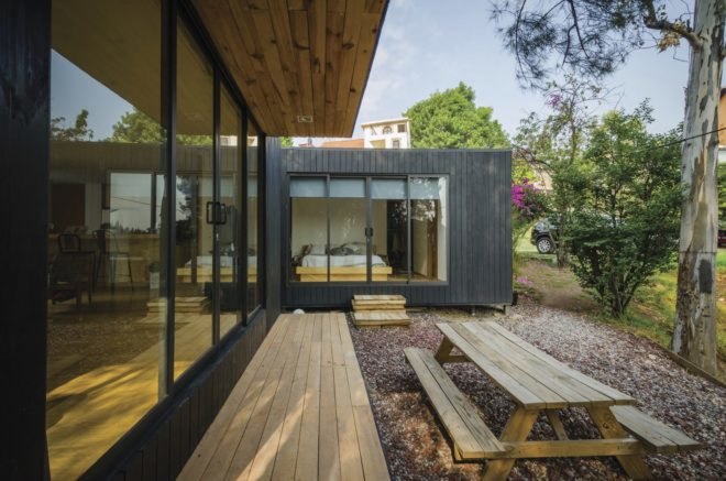 The Black Cabin by Revolution Architects, contemporary cabin in Mexico City, quiet cabin retreat in Mexico City, Mexico city contemporary residential architecture, passive ventilation in a cabin, modular cabin, sustainable cabin, green roofed cabin
