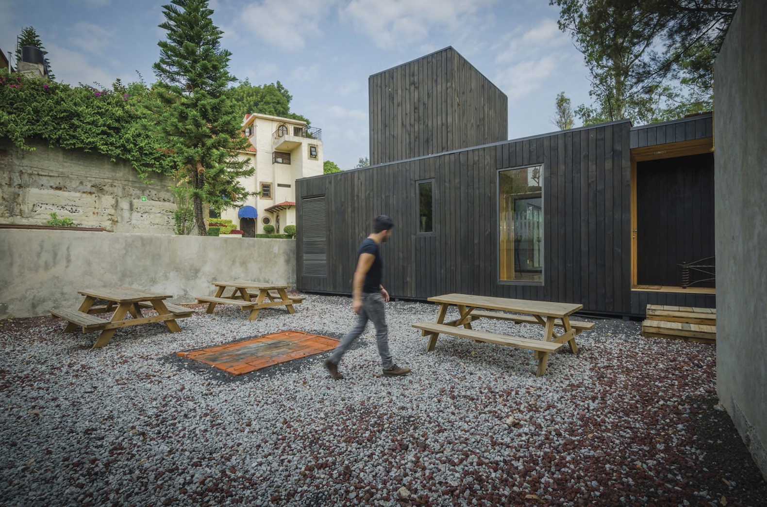 The Black Cabin by Revolution Architects, contemporary cabin in Mexico City, quiet cabin retreat in Mexico City, Mexico city contemporary residential architecture, passive ventilation in a cabin, modular cabin, sustainable cabin, green roofed cabin